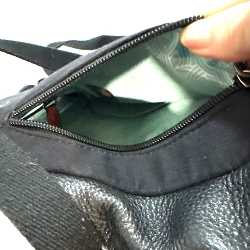 The Sak Black Leather Backpack Crossbody with Mint Patterned Interior - Picture 4 of 10